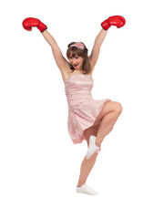 Playful woman boxer in country pose. A woman in boxing gloves is fooling around. Girl boxer in casual clothes. Portrait of a girl boxer on a white background. Female self defense concept