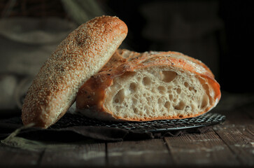 Food isometric. Sesame bread on a dark background