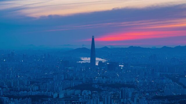 Time laps landscape Seoul South Korea and the sunsets and moving clouds.It is the tallest building in South Korea
