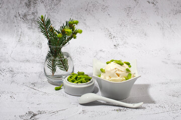 Ice cream with spruce tips.