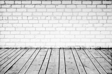 Brick wall and wood planks in old-style interior. Black And White