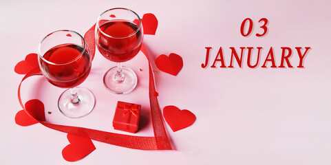 calendar date on light background with two glasses of red wine, red gift box and red hearts with...