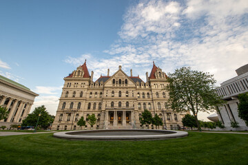Fototapeta na wymiar Albany, NY - USA - May 22, 2021: A western view of the historic Romanesque Revival New York State Capitol building.