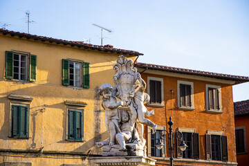 Statue of angels near the leaning tower of Pisa in Italy