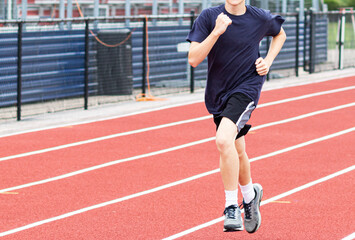 Fototapeta premium One runner running on a track
