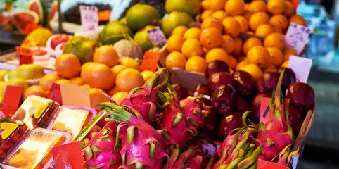 Stall of organic vegetables and fruits at a farmers market. Selling organic fresh agricultural product at farmer market.