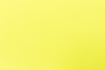 Bright yellow paper texture background, colored cardboard fibers and grainy texture, empty space photo