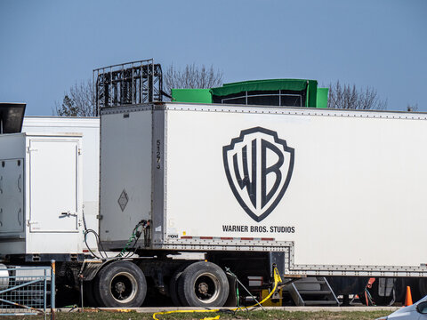Toronto, Canada, April 7, 2021; A warner Brothers Studio movie production truck in a parking lot,in this case at an outdoor set in Toronto.