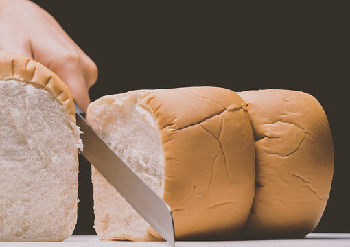 The Woman Is Making Bread At Home.