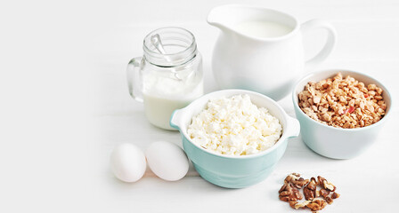 Clean eating healthy cooking ingredients. Food frame. Superfoods concept. Fitness Breakfast.Healthy eating and food, dieting, vegetarian kitchen, Cottage cheese and oatmeal with milk on table.