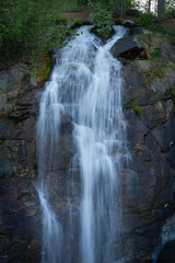 Fototapeta na wymiar Waterfall fed from a natural spring