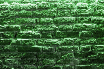 Pea green abstract background. Natural stone texture. Old verd blend backdrop for geology company banner, road builder ad poster, flyer. Abstract green-colored flat lay rock. Grass-green rough rock be