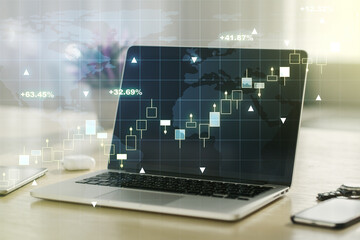 Multi exposure of abstract financial graph with world map on modern computer background, financial and trading concept