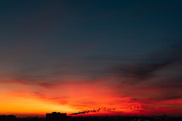 orange sunset over big city