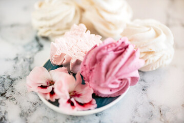 Beautiful delicious dessert. Zephyr in the shape of flowers roses.