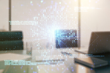 Double exposure of creative code skull hologram and modern desktop with laptop on background. Malware and cyber crime concept