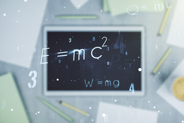 Creative scientific formula illustration and modern digital tablet on desktop on background, top view, science and research concept. Multiexposure