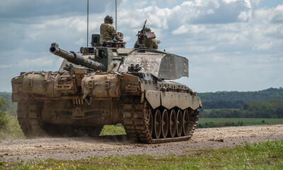a british army Challenger 2 ii FV4034 main battle tank in action on a military battle exercise, ...