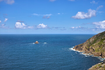Fototapeta na wymiar Islet and cliffs on the coast of death, in northwestern Spain