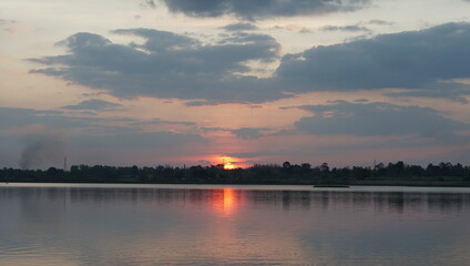 Naklejka premium sunrise over the river