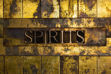 Spirits text on grunge textured copper and gold background