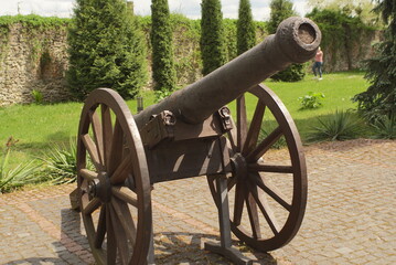 Old cannon on the pavement 
