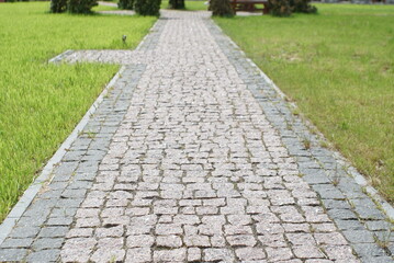 Granite pavement. Footpaths with granite cobblestones 