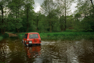 car on river