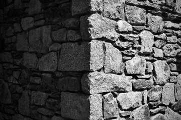 stone brick texture of an alpine chalet - black & white