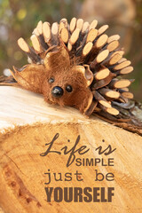 Inspirational motivation quote. Positive message says Life is simple, just be yourself. Selective focus.