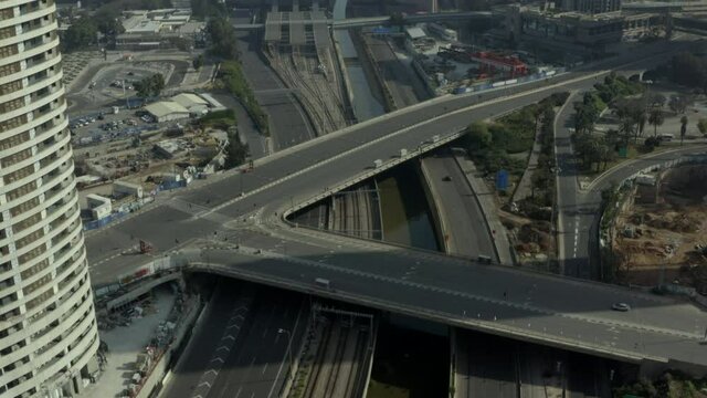 Aerial Shot Of Highway In City During Lockdown, Drone Flying On Sunny Day - Tel Aviv, Israel