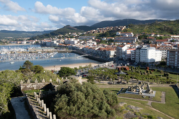 Fototapeta na wymiar Pinta caravel, port and yacht club from the fortress of Baiona