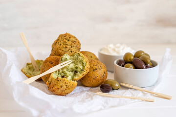 Cottage cheese donuts with herbs.
