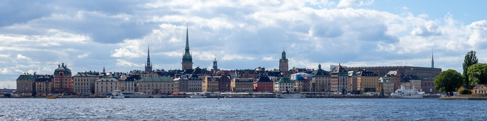 Stockholm skyline including royal palace from waterway.