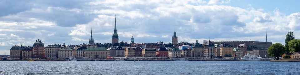 Wandcirkels aluminium Stockholm skyline including royal palace from waterway. © Dawn
