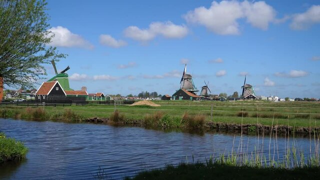 Windmills of Zaanse Schans in Dutch landscape