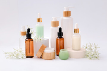 Fototapeta na wymiar Natural cosmetic skincare bottle containers on light background. Natural beauty
