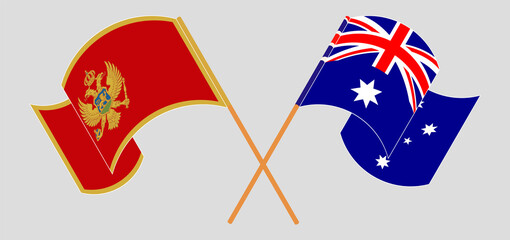 Crossed and waving flags of Montenegro and Australia