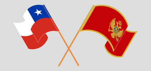 Crossed and waving flags of Chile and Montenegro