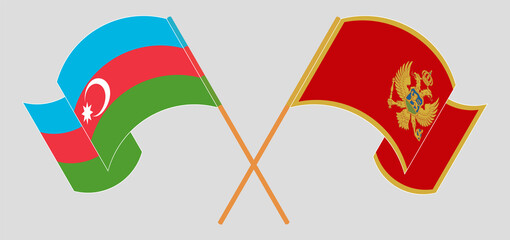 Crossed and waving flags of Montenegro and Azerbaijan