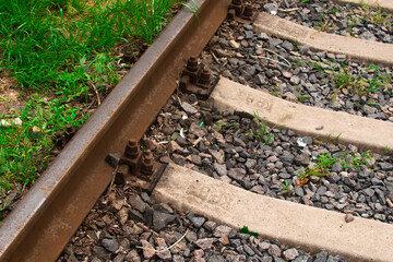 railway. rails and sleepers are installed on the gravel. the old railway. rust on the rails