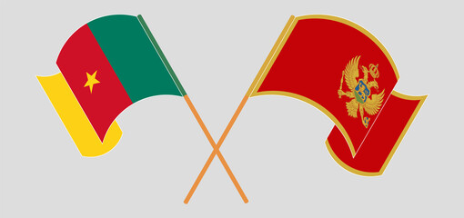 Crossed and waving flags of Cameroon and Montenegro