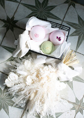 Natural cosmetics in the bathroom interior with flowers. Top view, flat, aesthetics, minimalism
