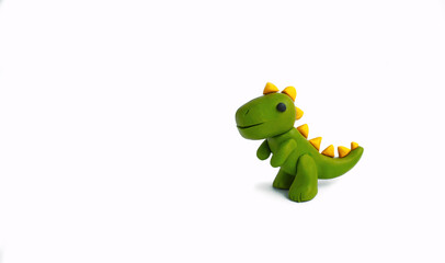 plasticine dinosaur on a white background
