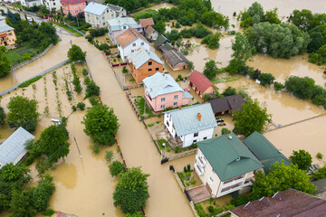 Aerial view of flooded houses with dirty water of Dnister river in Halych town, western Ukraine.