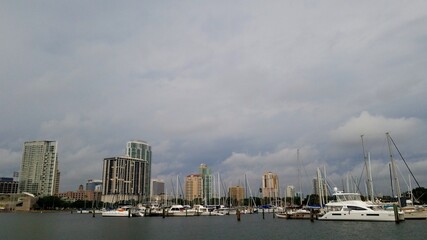 Fototapeta na wymiar Dark clouds over a boat marina