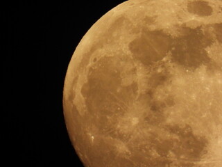 Full moon against the black sky