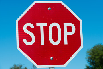 stop sign on blue sky