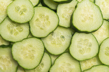 Sliced cucumber background. Fresh cucumber ring slice.