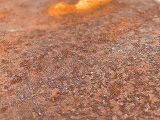 Surface texture of old scratched ginger rusty oxidized bad iron corroded metal. The background